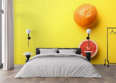 Tasty grapefruit on color background Wall mural