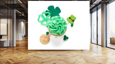 Tasty green cupcake with decor for St. Patrick's Day on white background Wall mural