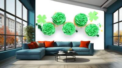 Tasty green cupcakes with decor for St. Patrick's Day on white background Wall mural