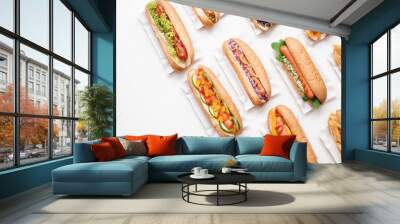 Tasty hot dogs on white background Wall mural