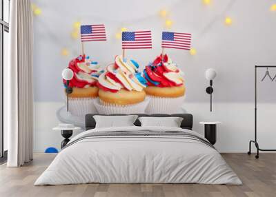 Tasty patriotic cupcakes on table Wall mural