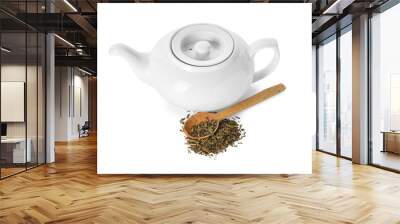 Tea pot and spoon with dry hojicha green tea on white background Wall mural