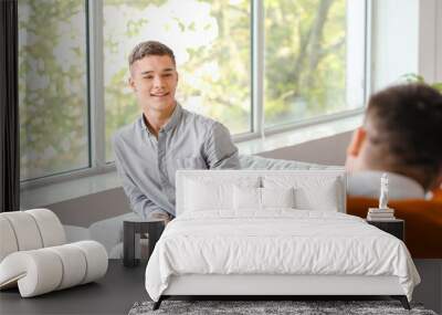 Teenage boy at psychologist's office Wall mural