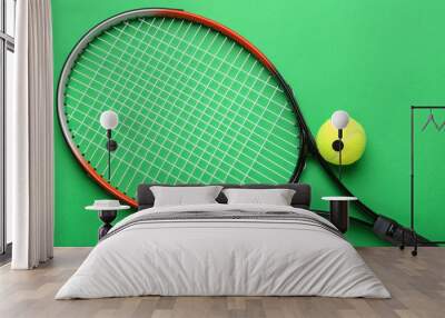 Tennis racket and ball on color background Wall mural