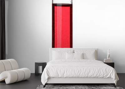 Test tube with color sample on white background Wall mural