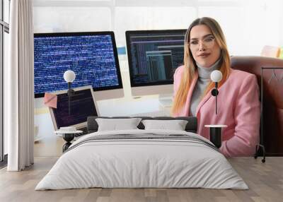 Transgender programmer working in office Wall mural