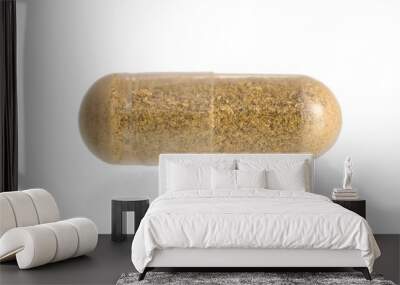 Vitamin K capsule on white background Wall mural