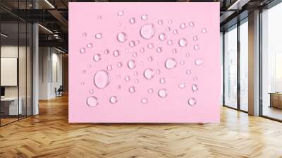 Water drops on pink background Wall mural