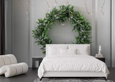 White door with Christmas mistletoe wreath and glowing lights in hall, closeup Wall mural