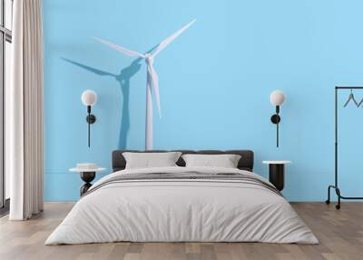 Wind turbine model on blue background Wall mural