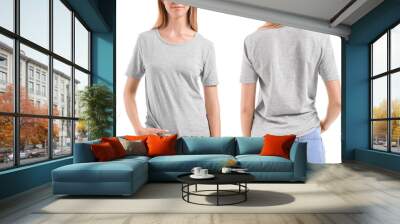 Woman in stylish t-shirt on white background. Front and back view Wall mural