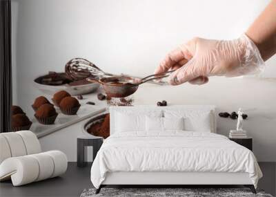 Woman preparing sweet truffles Wall mural