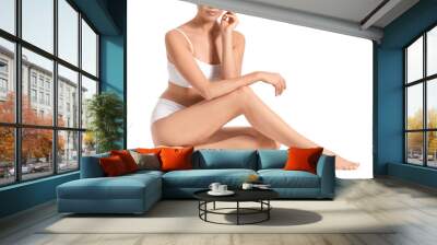 Woman with beautiful legs after depilation on white background Wall mural