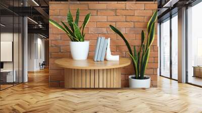 Wooden coffee table with houseplants and stylish holder for books in room near brick wall Wall mural