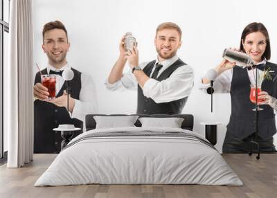 Young bartenders on white background Wall mural