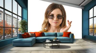 Young woman with stylish sunglasses on white background Wall mural