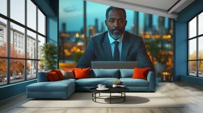 Businessman Working Late in Office with City View Wall mural