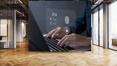 Person using laptop and touching virtual screen for two-factor authentication for safety use of social networks and access to information privacy Wall mural