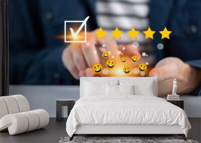 Satisfaction and customer service survey concept, business people using  smartphone. to answer the questionnaire And the satisfaction rating, the satisfaction rating with the smiley face icon 5 stars. Wall mural