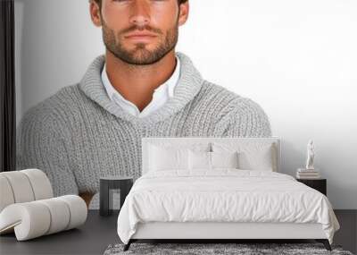 A young man in a gray knit sweater poses confidently with arms crossed, showcasing a relaxed yet stylish appearance. Wall mural