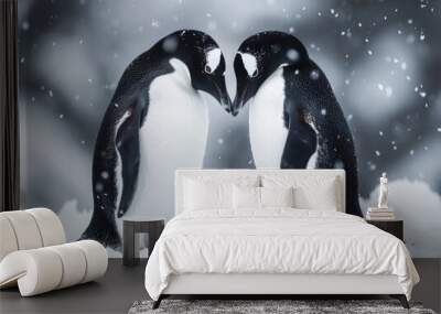 Penguin Pair in Antarctic Snow. A touching scene of two Adélie penguins, heads touching, surrounded by a gentle snowfall, reflecting love and companionship.
 Wall mural