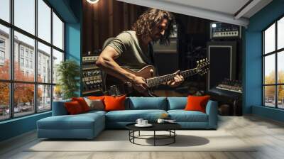 man playing guitar in a music studio Wall mural