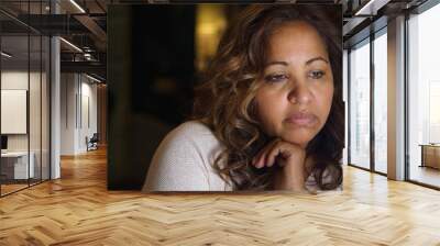 stressed woman looking unhappy. Wall mural