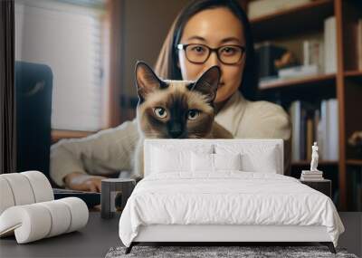 Woman posing with her cat Wall mural