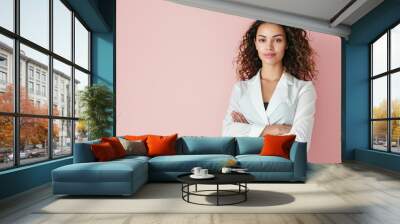 A confident woman in a power pose, against a simple and clean background Wall mural