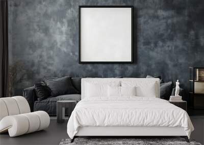 Chic living room featuring a dark gray sofa, textured wall with a blank frame, and minimalist decor, creating a stylish and moody ambiance. Wall mural