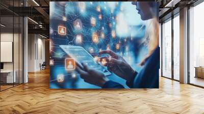 Silhouette of a woman using a tablet, surrounded by digital icons and network connections, representing technology and communication. Wall mural