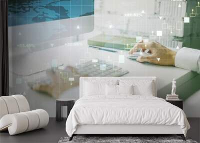 Abstract creative financial graph with world map and hands typing on laptop on background, financial and trading concept. Multiexposure Wall mural