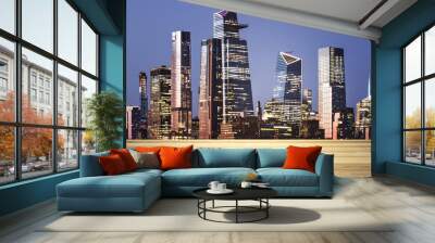 Blank tabletop made of wooden planks with beautiful New York cityscape at evening on background, mockup Wall mural