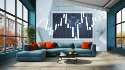 Multi exposure of abstract creative financial graph and modern digital tablet on background, top view, forex and investment concept Wall mural