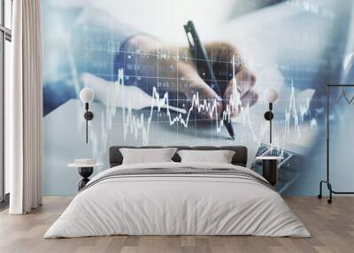 Multi exposure of abstract financial graph with hand writing in notebook on background, financial and trading concept Wall mural