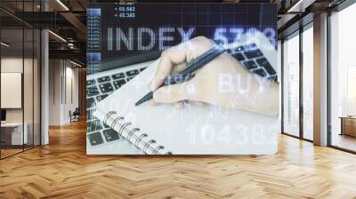 Multi exposure of abstract financial graph with hand writing in notebook on background, financial and trading concept Wall mural