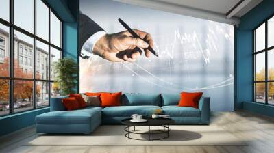 Multi exposure of trader hand with pen working with virtual abstract financial graph interface on blurred office background, financial and trading concept Wall mural