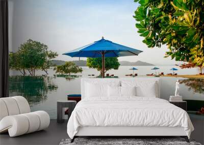 Vacation Relaxation resort beach bed in infinity pool tropical sea view, Phuket Thailand Wall mural