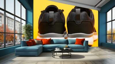 Back view of black sport shoes Wall mural