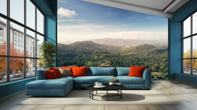 Farm in mountain green landscape Wall mural