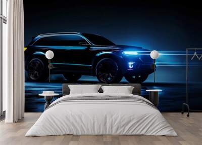 A dark blue SUV vehicle with headlights on is illuminated against the background of darkness captures the sleek lines and design details of the automobile Wall mural