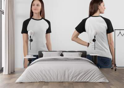 Front back view of female model wearing white and black raglan plain shirt Wall mural