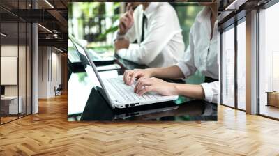 business woman hand typing on laptop keyboard Wall mural