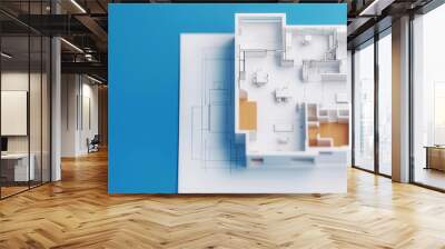 Aerial view of a white architectural model showcasing a modern house layout on a blue background for design inspiration. Wall mural