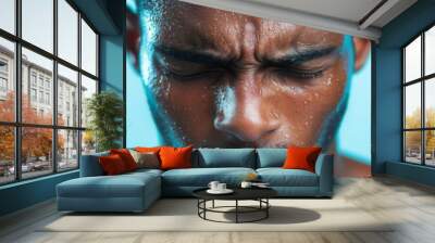 Athlete's face contorted in pain, with sweat dripping, symbolizing the struggle and endurance, pain, health, athlete Wall mural