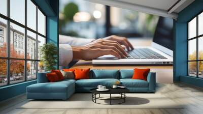 Image of hands typing information on a computer Wall mural