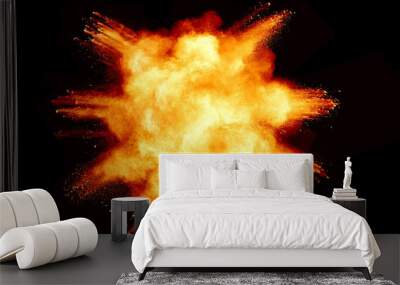 Abstract orange powder explosion isolated on black background. Wall mural