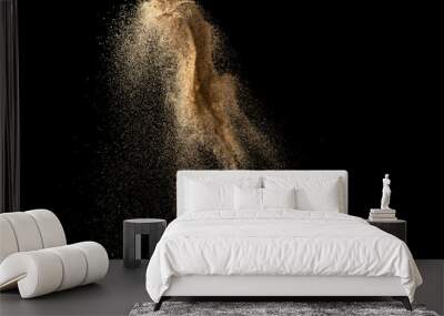 Gold sand explosion isolated on black background. Abstract sand cloud. Wall mural