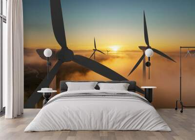 Wind turbine silhouette at sunrise, wind energy and nature concept. Wall mural