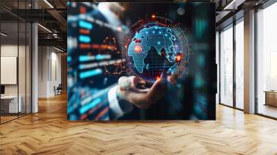 Technologies connecting the world. Businessman holding a virtual earth with network connection. Wall mural